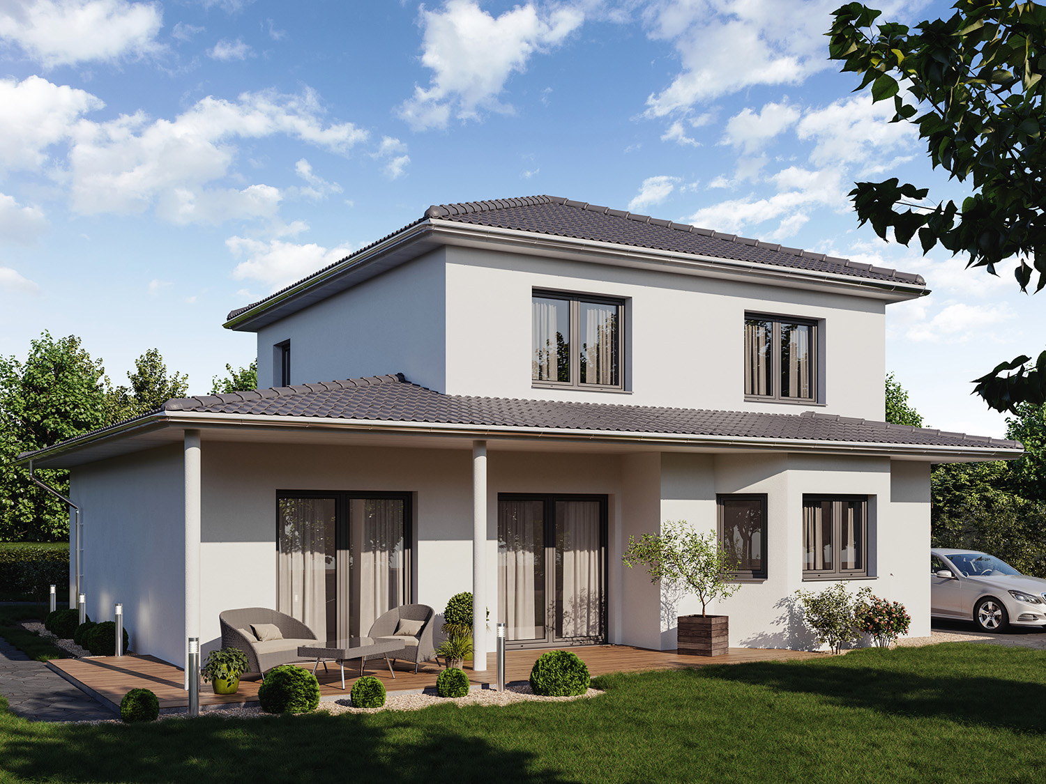Zauberhafte Villa Sevilla im mediterranen Stil und überdachter Terrasse als Holzrahmenhaus (Fertighaus) oder Massivhaus Hausbau in  Braunschweig, Königslutter, Gifhorn, Peine, Wolfsburg, Salzgitter und Wolfenbüttel.